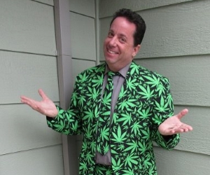 Alan Katz in green cannabis-themed Wedding Officiant suit